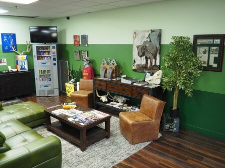 Picture of an indoor archery range, family fun where safety is prioritized